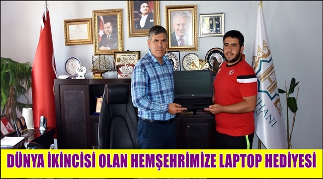 BAŞKAN SOLAK DÜNYA İKİNCİSİ OLAN SULTANHANLI HEMŞEHRİMİZE LAPTOP HEDİYE ETTİ