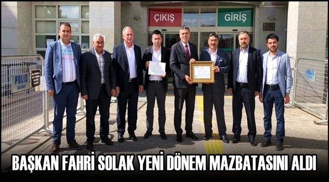 BAŞKAN FAHRİ SOLAK YENİ DÖNEM MAZBATASINI ALDI