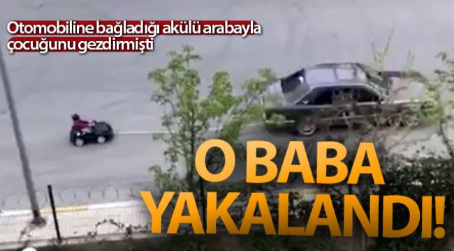 Otomobiline bağladığı akülü arabayla çocuğunu gezdiren baba yakalandı