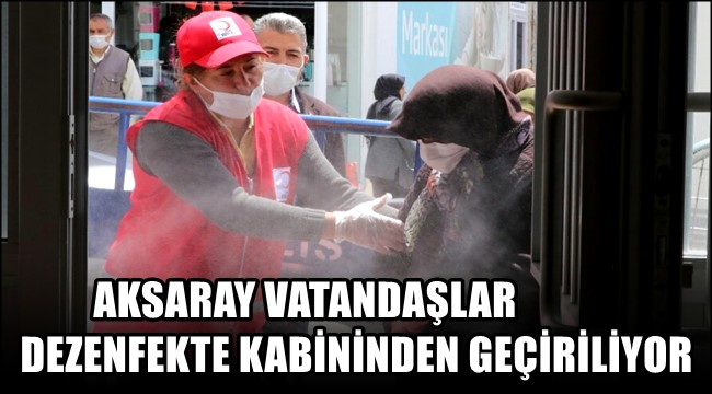 AKSARAY&#039;DA VATANDAŞLAR DEZENFEKTE KABİNİNDEN GEÇİRİLİYOR
