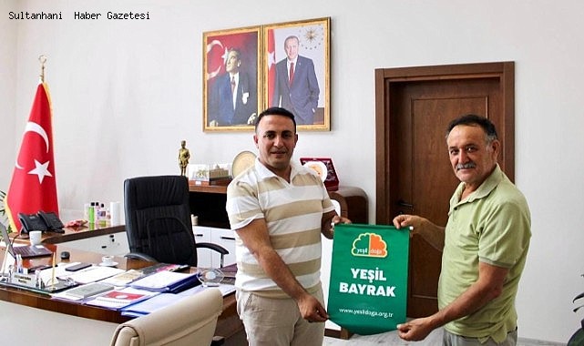 SULTANHANI KAYMAKAMINA PRESTİJLİ YEŞİL BAYRAK ÖDÜLÜ